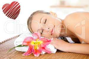 Composite image of portrait of a cute woman having a massage