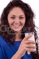 beautiful smiling woman is drinking milk