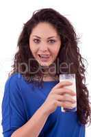 beautiful smiling woman is drinking milk