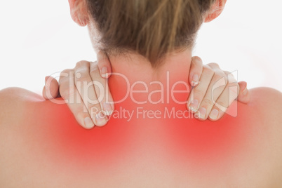 Closeup of of woman massaging neck