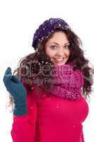 beautiful smiling brunette woman in snow in winter