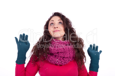 beautiful smiling brunette woman in snow in winter