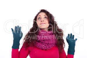 beautiful smiling brunette woman in snow in winter