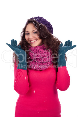 beautiful smiling brunette woman in snow in winter