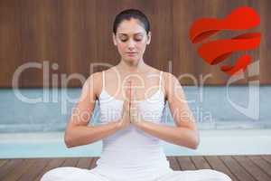Composite image of peaceful woman in white sitting in lotus pose