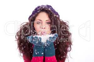 beautiful smiling brunette woman in snow in winter