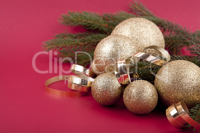 beautiful golden christmas decoration on red background