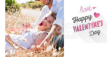Composite image of attractive couple relaxing in the countryside