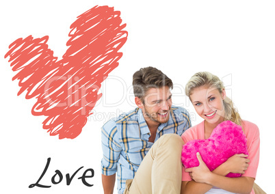 Composite image of attractive young couple sitting holding heart