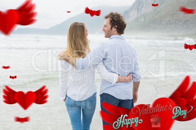 Composite image of rear view of a romantic couple at beach Composite image of rear view of a romantic couple at beach