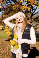 young woman in autumn sunshine outdoor