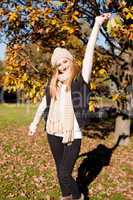 young woman in autumn sunshine outdoor