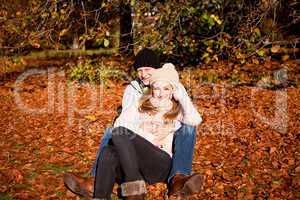 happy young couple smilin in autumn outdoor