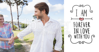 Composite image of smiling couple standing outside together in t