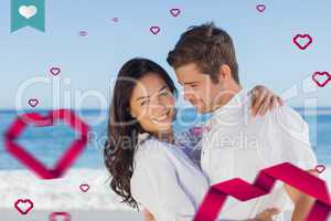 Composite image of young couple embracing and posing on the beac