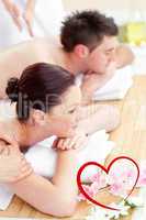 Composite image of attractive young couple enjoying a back massa