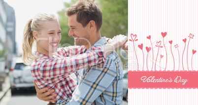 Composite image of couple in check shirts and denim hugging each