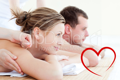 Composite image of attractive young couple having an acupunctre