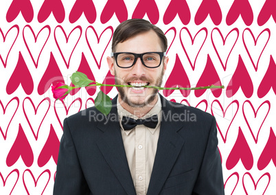 Composite image of geeky hipster holding rose between teeth