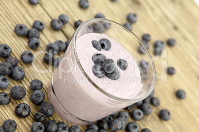 fresh delicious blueberry yoghurt shake dessert on table