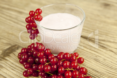 deliscious fresh currant yoghurt shake dessert on table