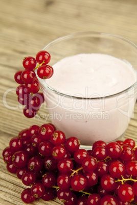 deliscious fresh currant yoghurt shake dessert on table