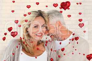 Composite image of happy couple laughing together woman looking