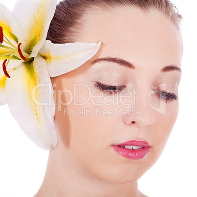 young beautiful woman portrait with white flower