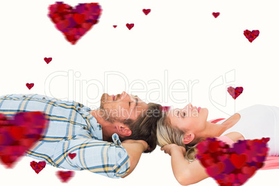 Composite image of attractive young couple sleeping peacefully
