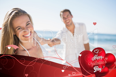 Composite image of pretty woman smiling at camera with boyfriend