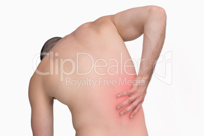 Rear view of shirtless man with back pain