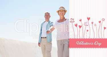 Composite image of happy senior couple walking on the pier