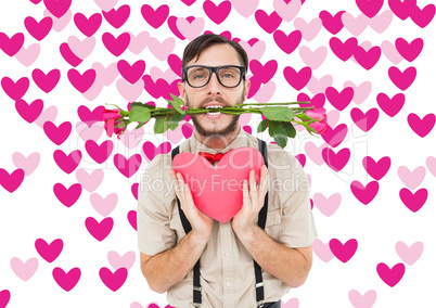 Composite image of geeky hipster offering valentines gifts