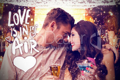 Composite image of cute couple drinking