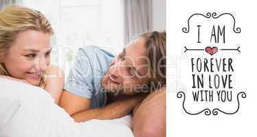 Composite image of happy couple relaxing on bed smiling at each