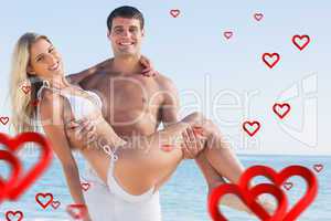 Composite image of man carrying his pretty girlfriend smiling at