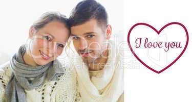 Composite image of close up portrait of a loving couple in winte