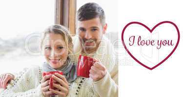 Composite image of loving couple in winter clothing with coffee