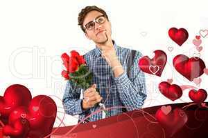 Composite image of geeky hipster holding a bunch of roses