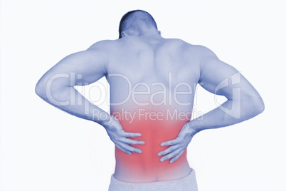 Rear view of shirtless man with back pain