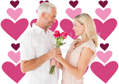 Composite image of affectionate man offering his partner roses