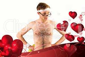 Composite image of geeky shirtless hipster posing with dumbbell