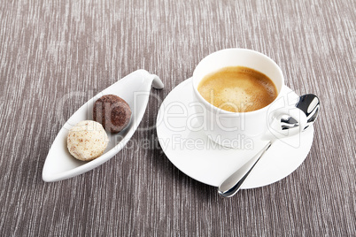 cup of coffee with mixed pralines