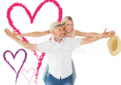 Composite image of happy man giving his partner a piggy back