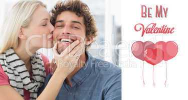 Composite image of woman kissing man on his cheek