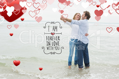 Composite image of full length of a couple dancing at beach