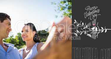 Composite image of loving and happy couple dancing at park