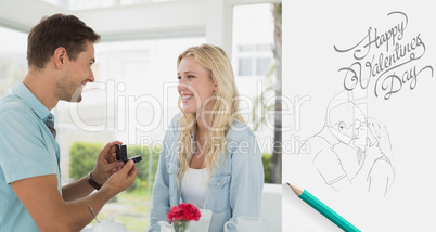 Composite image of man proposing marriage to his blonde girlfrie