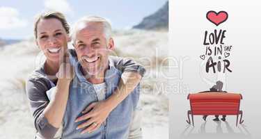 Composite image of happy hugging couple on the beach looking at