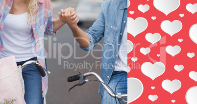 Composite image of hip young couple going for a bike ride